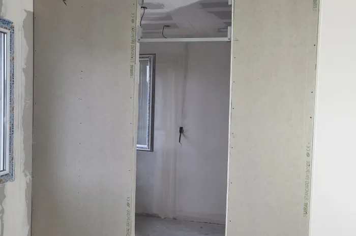 Création d'une porte coulissante séparative chez un particulier à Bourg en Bresse