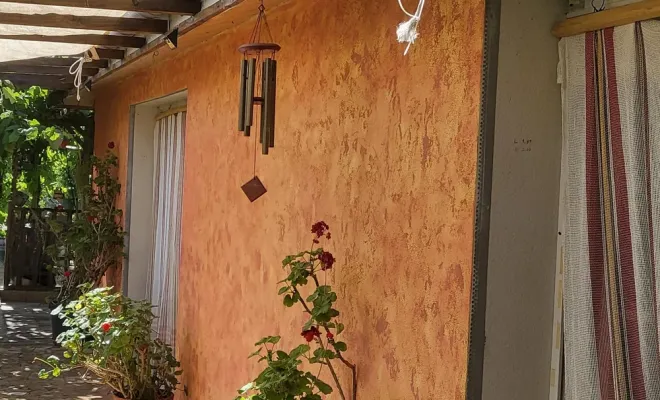 Isolation et peinture de la façade d'une maison à PERONNAS, Bourg-en-Bresse, L'Art Italien - NERI Mauro